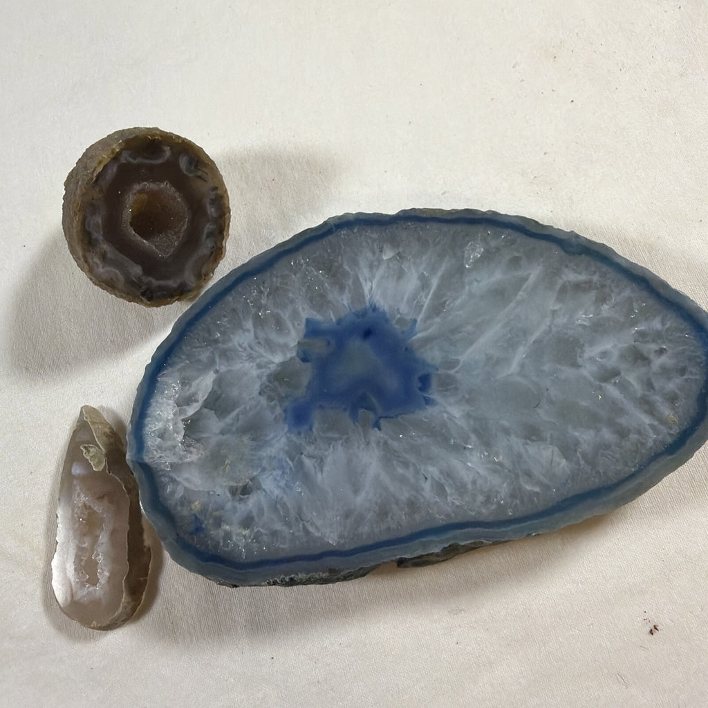Dyed blue agate Geode sliced  & 2 brown, and beige agate geodes ￼